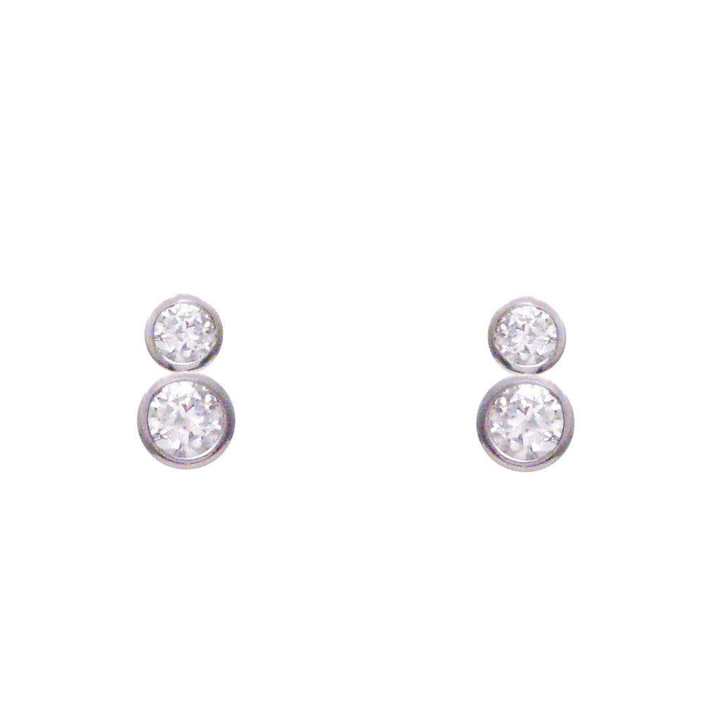 Sterling silver, rhodium plated, round brilliant cut cubic zirconia double drop earrings.